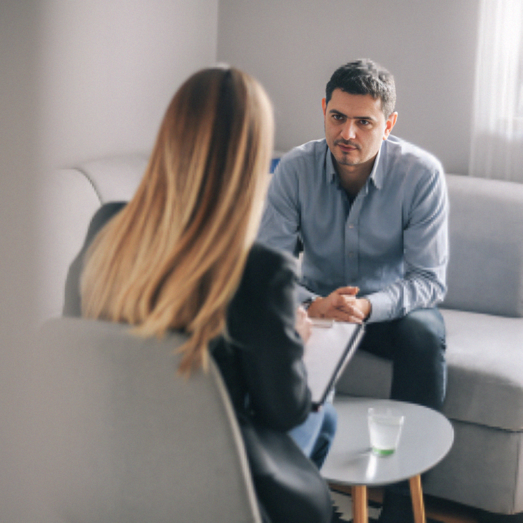 A mental health provider listening to a client