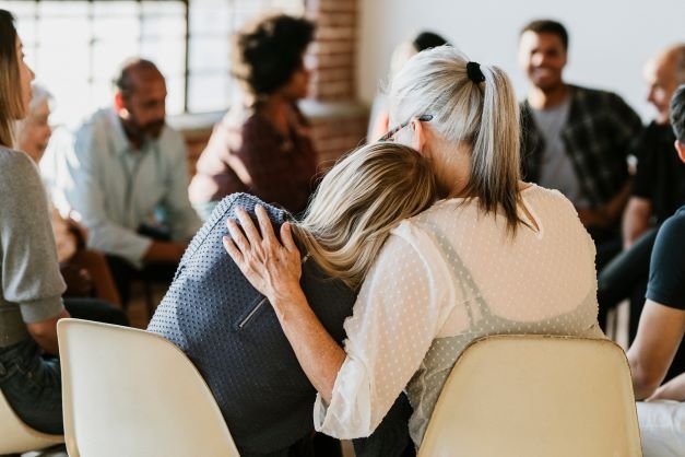 A mental health professional meeting with a client